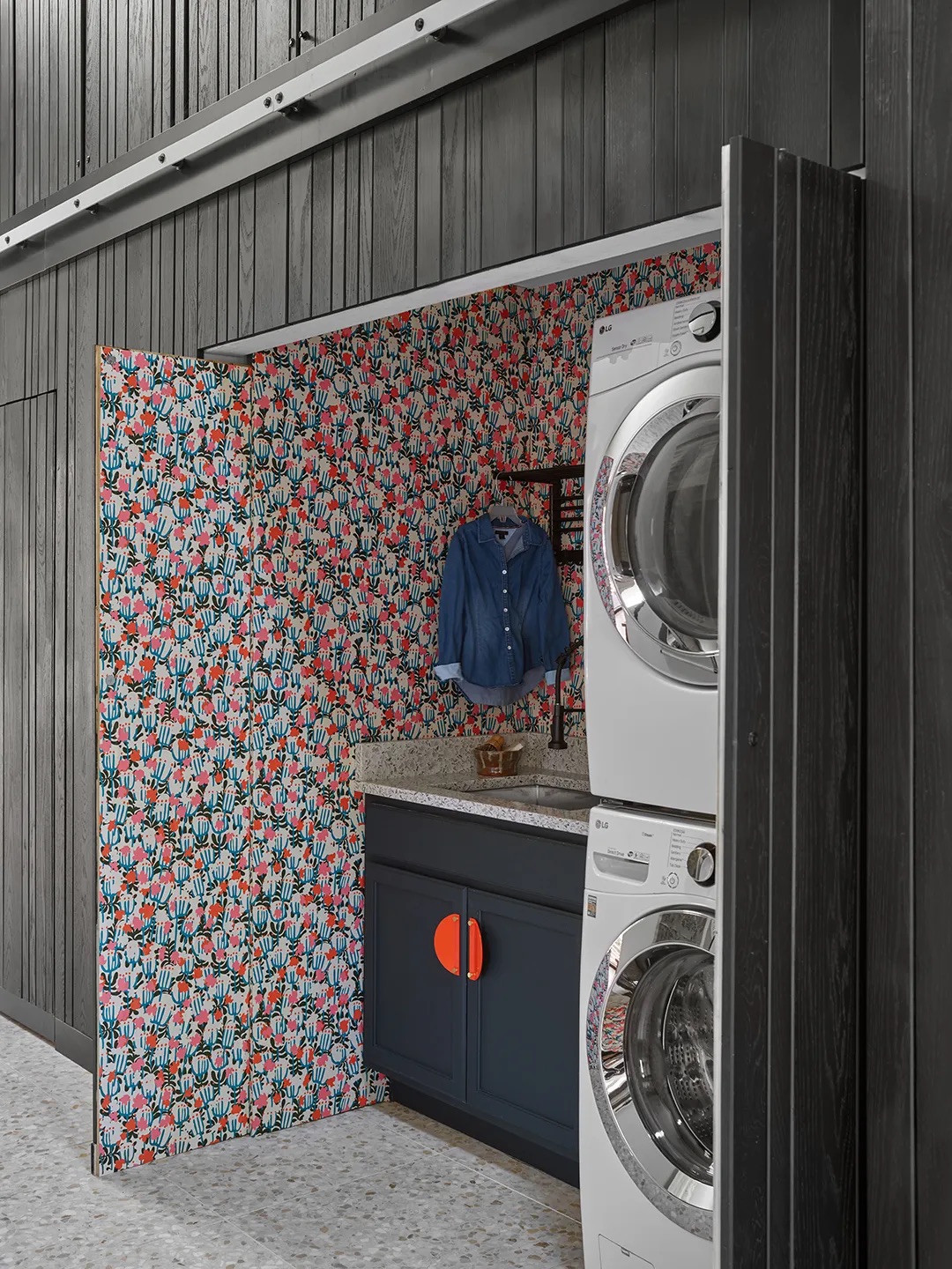 wallpapered laundry closet