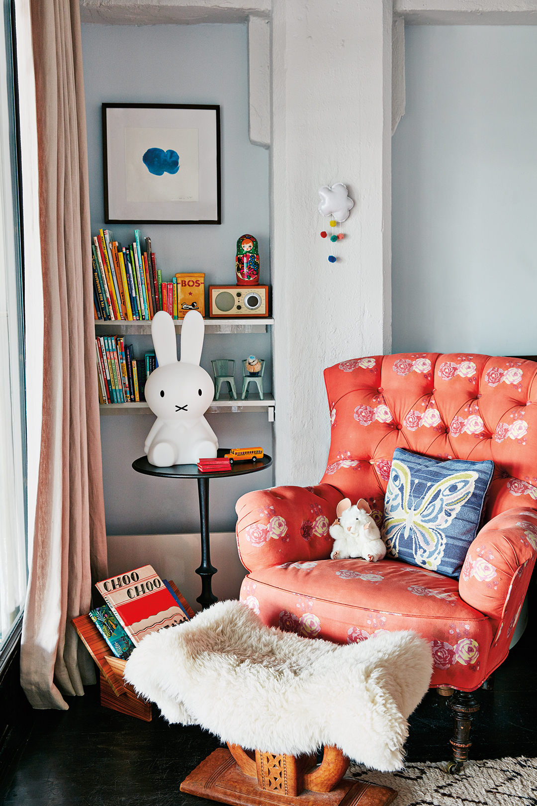 pink patterned armchair in child's room