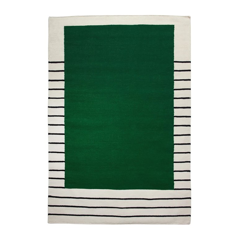  white and black striped rug with green rectangle