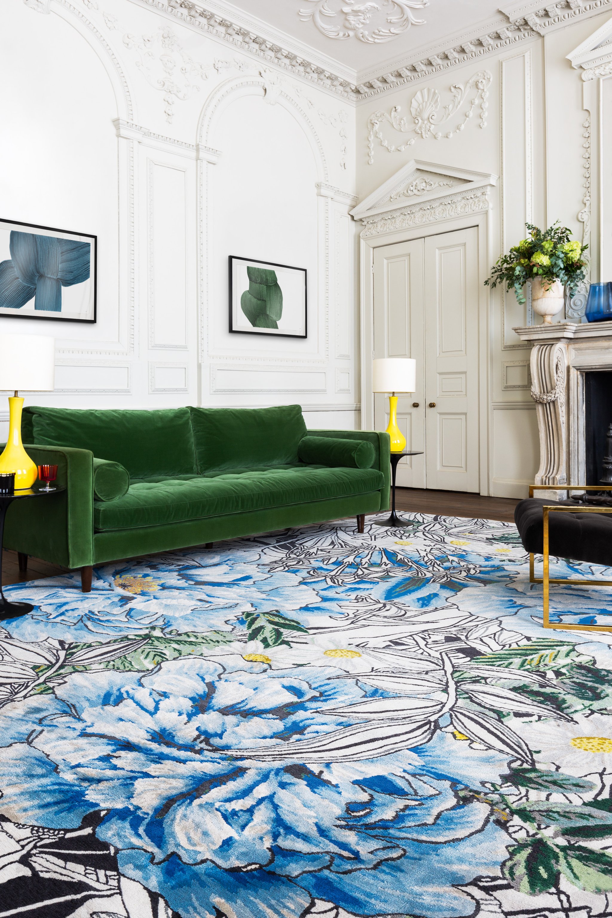 blue floral rug and green sofa
