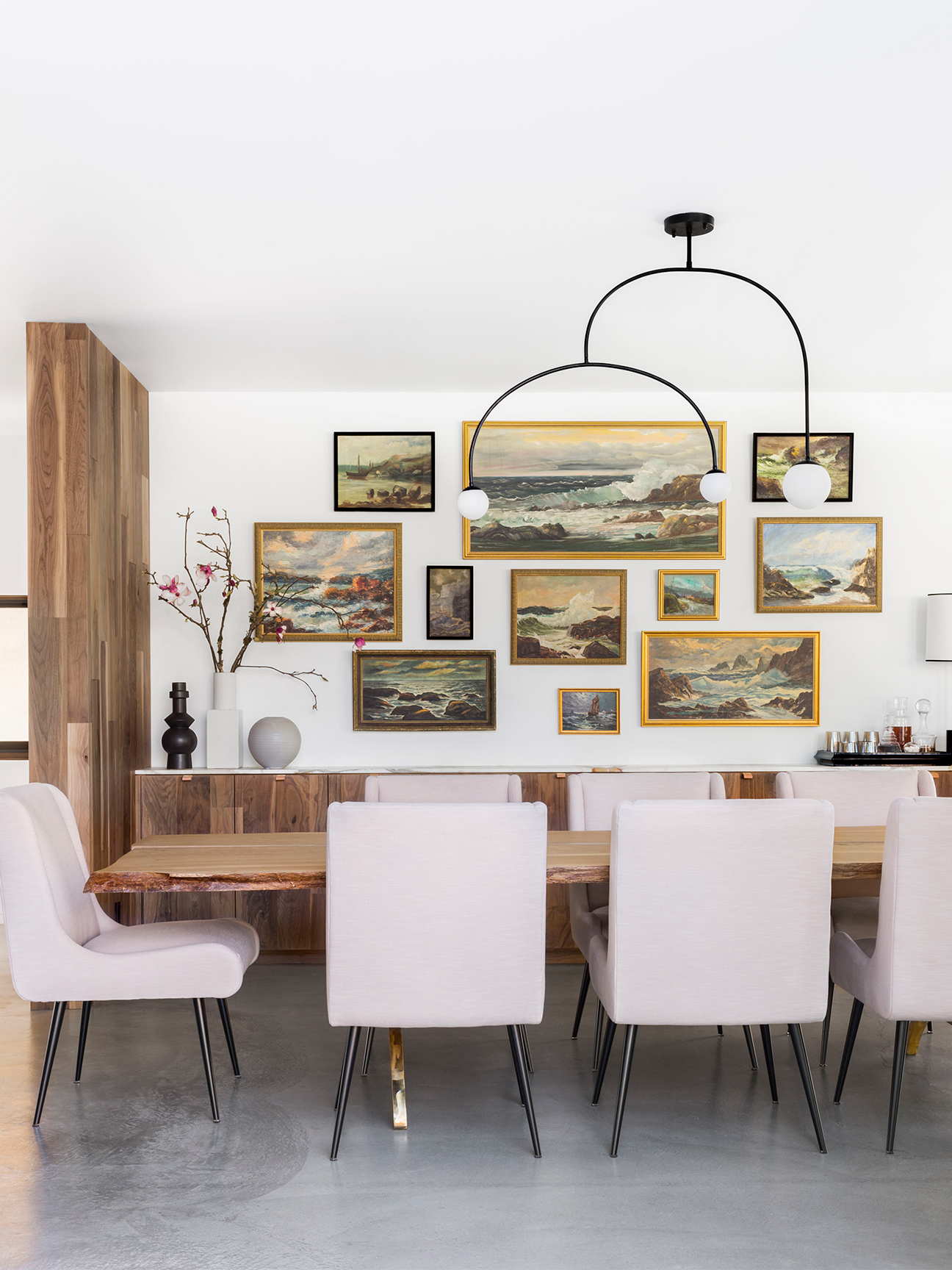 pink chairs in dining room and wood console