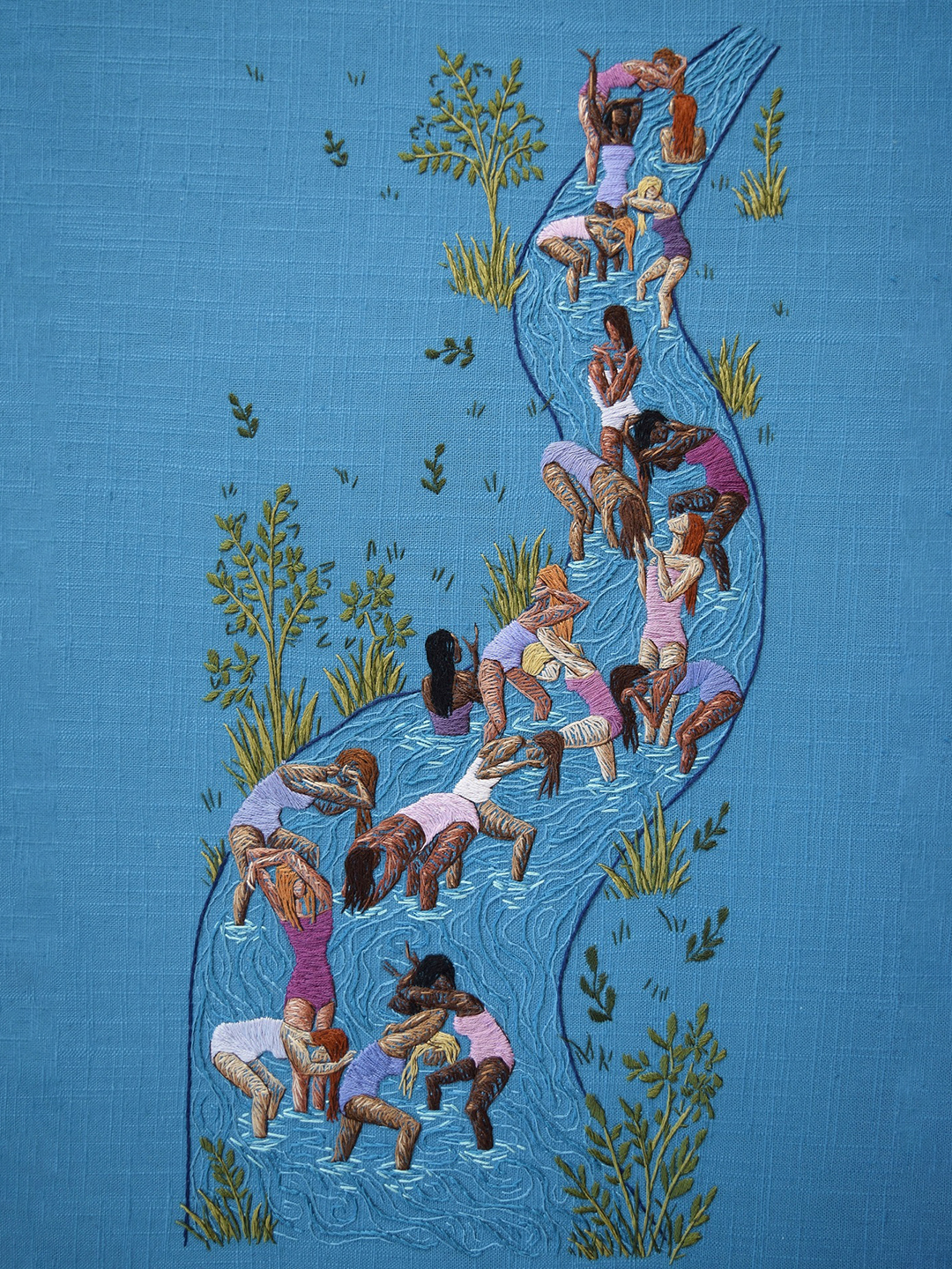 Embroidery art of women in a stream