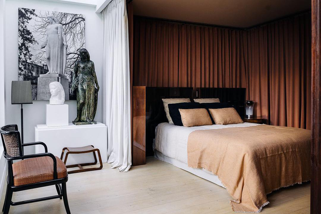 brown bedroom with canopy