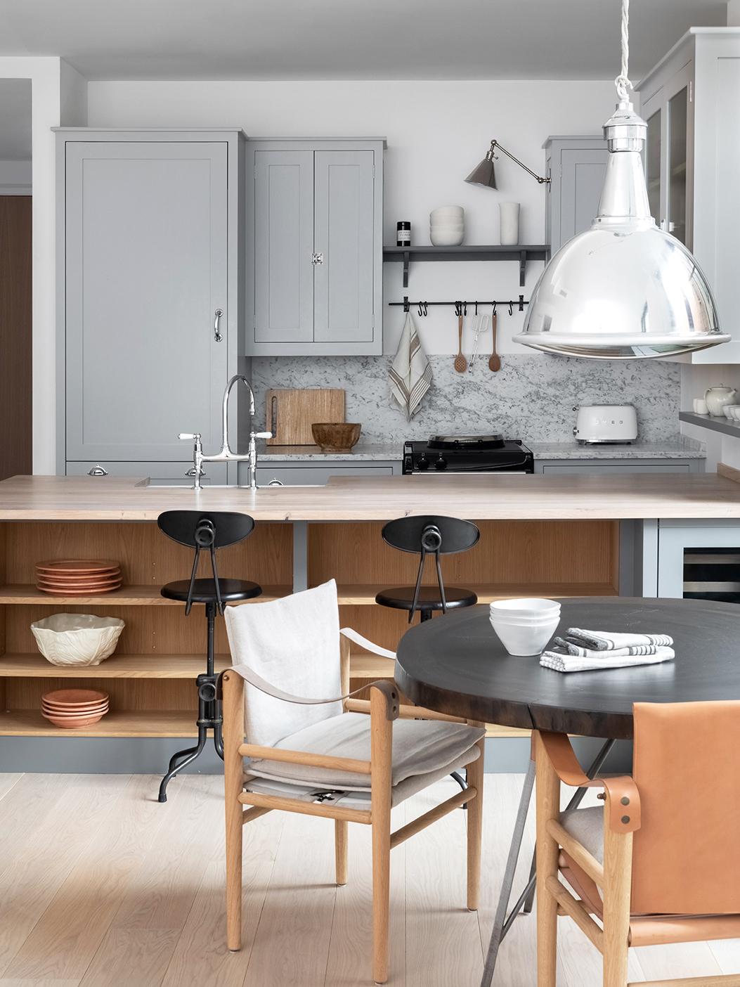 rustic kitchen with industrial lighting