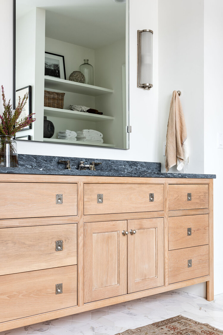 bathroom vanity with twin mirrors and tall legs