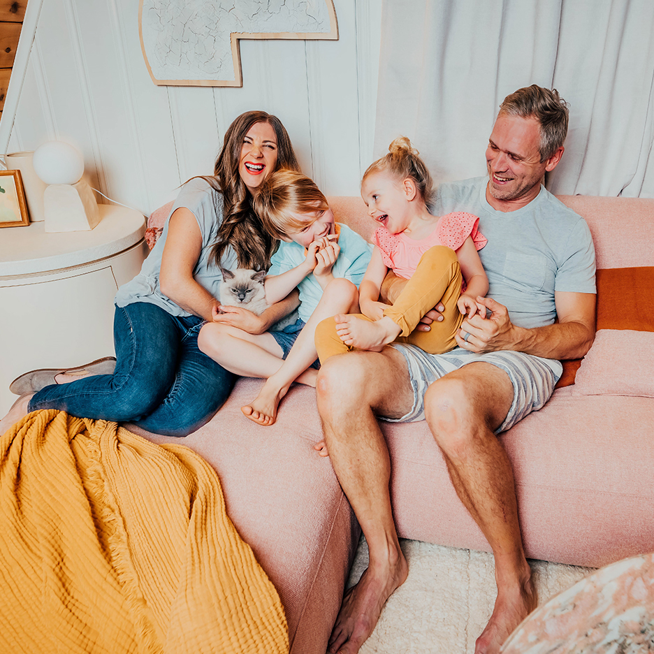 Paul and Kristy Benson with their kids