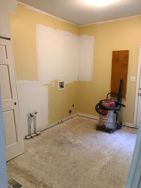 drab yellow room