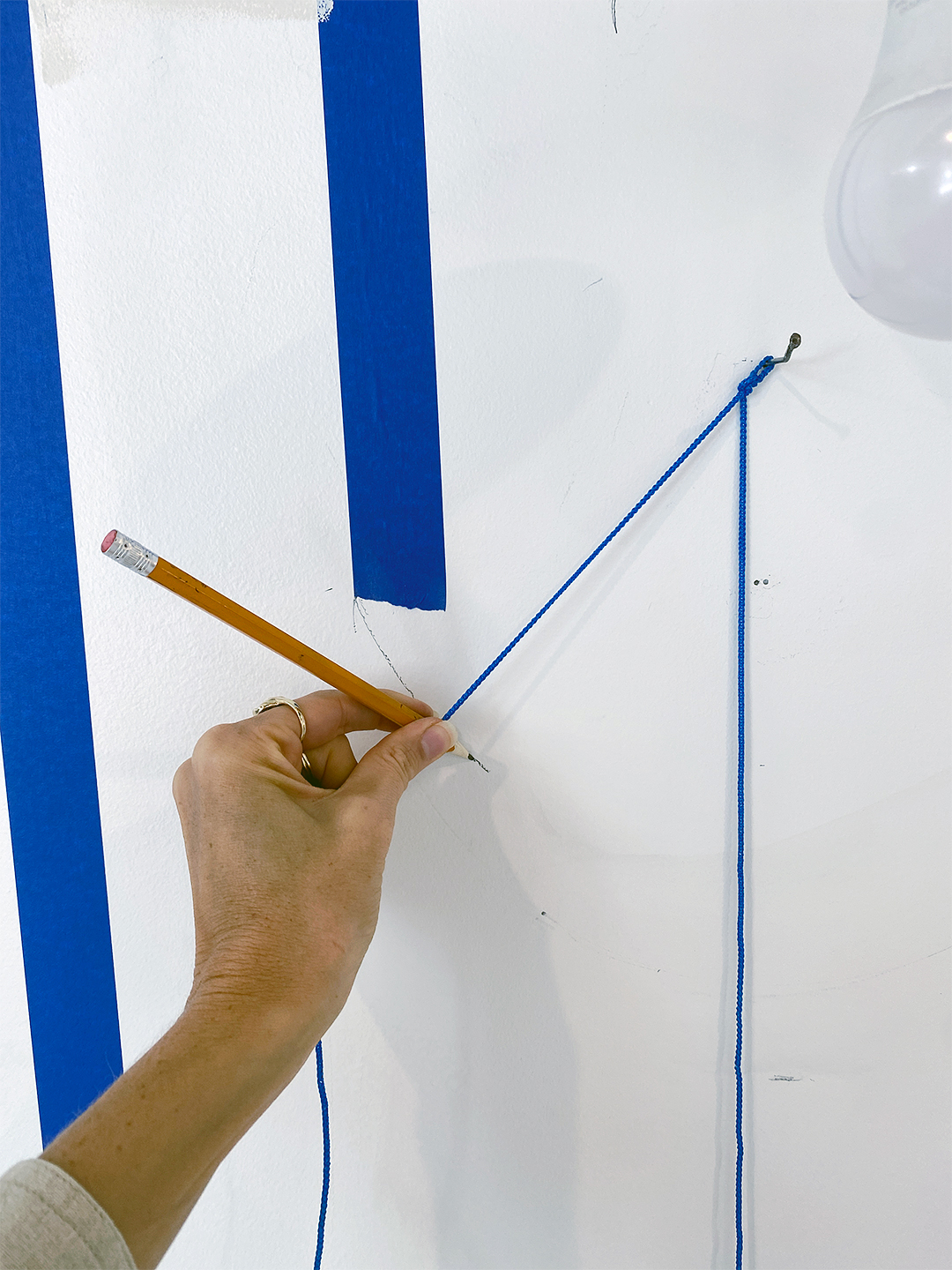 measuring with a pencil and string