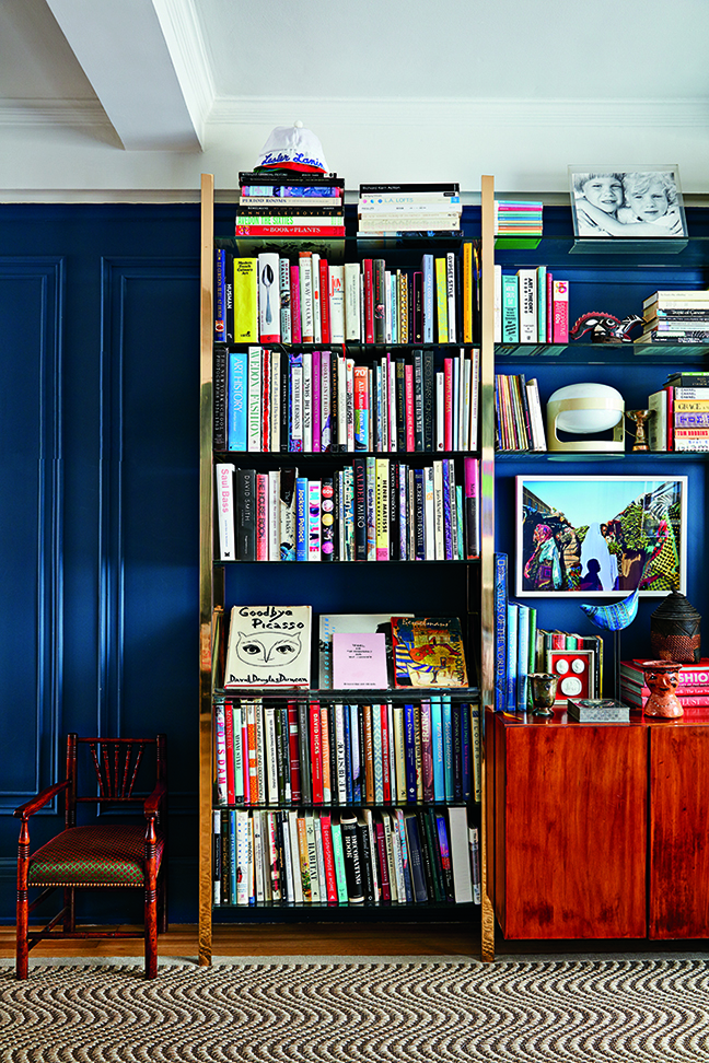 blue walls with bookshelf