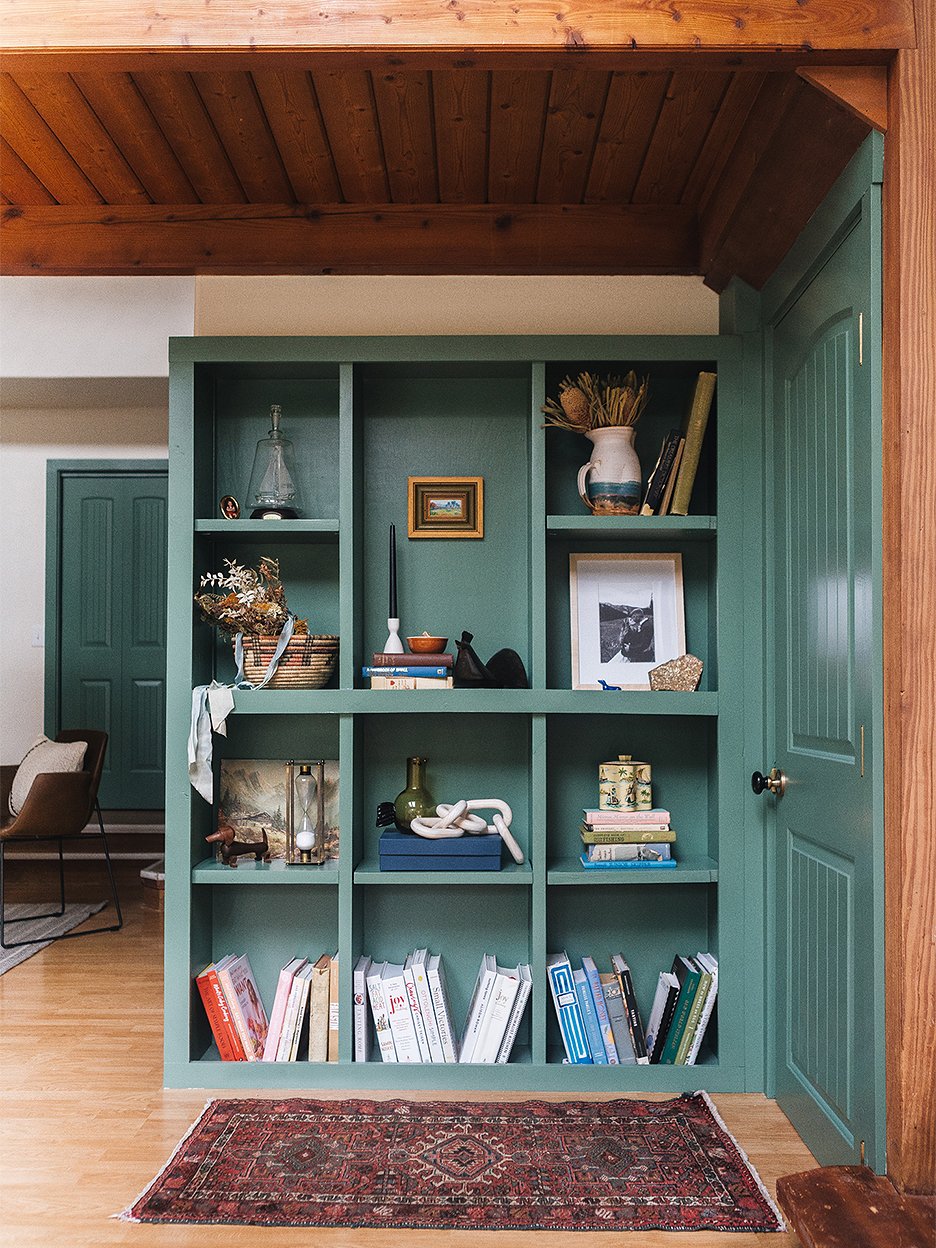 Green painted open shelves