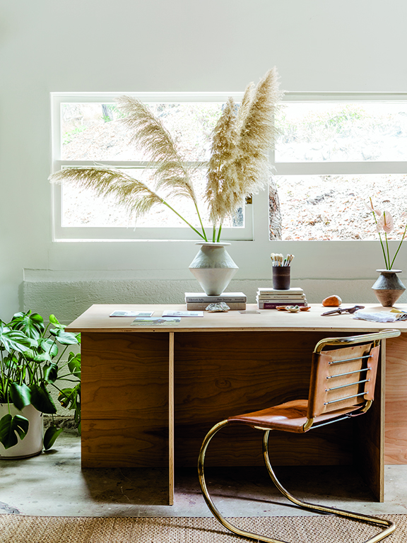 wood desk in white simple room