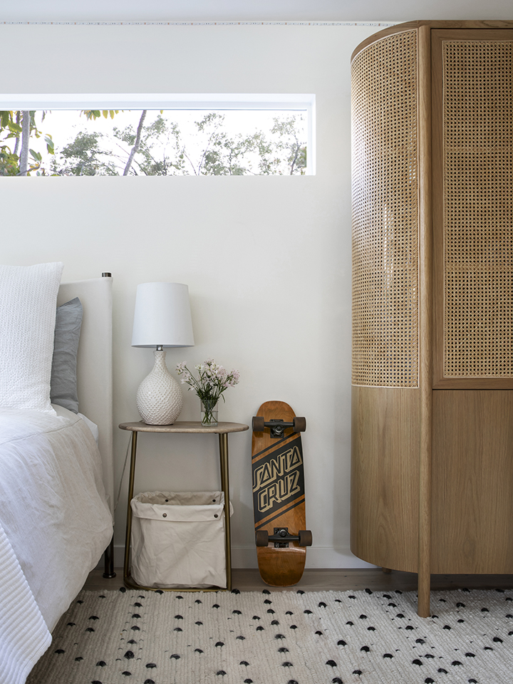 skateboard next to nighstand