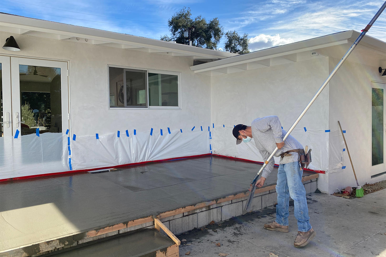man installing patio