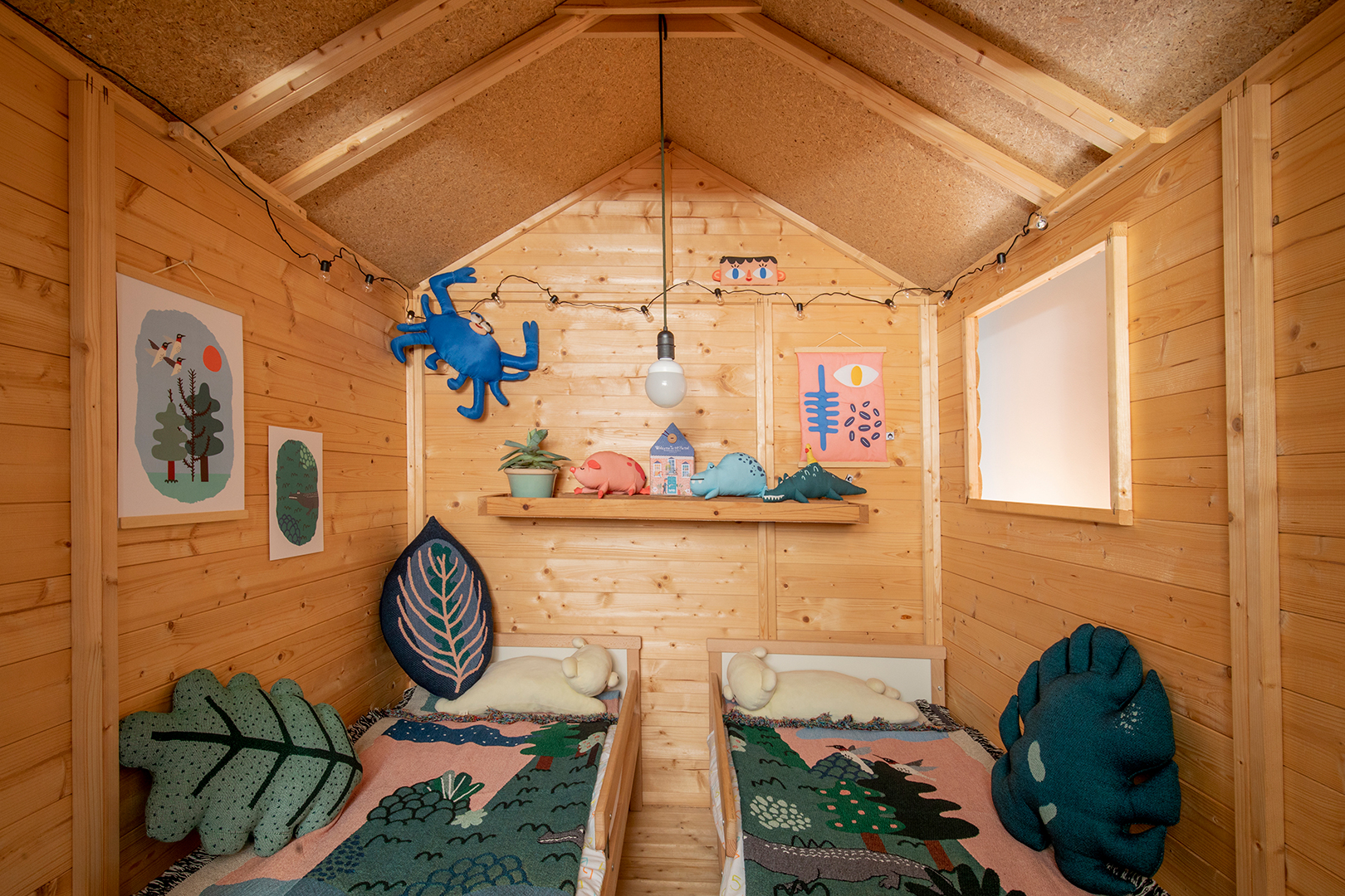 wooden bunkhouse with kids beds