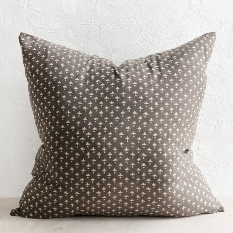  grey and brown pillow with dots
