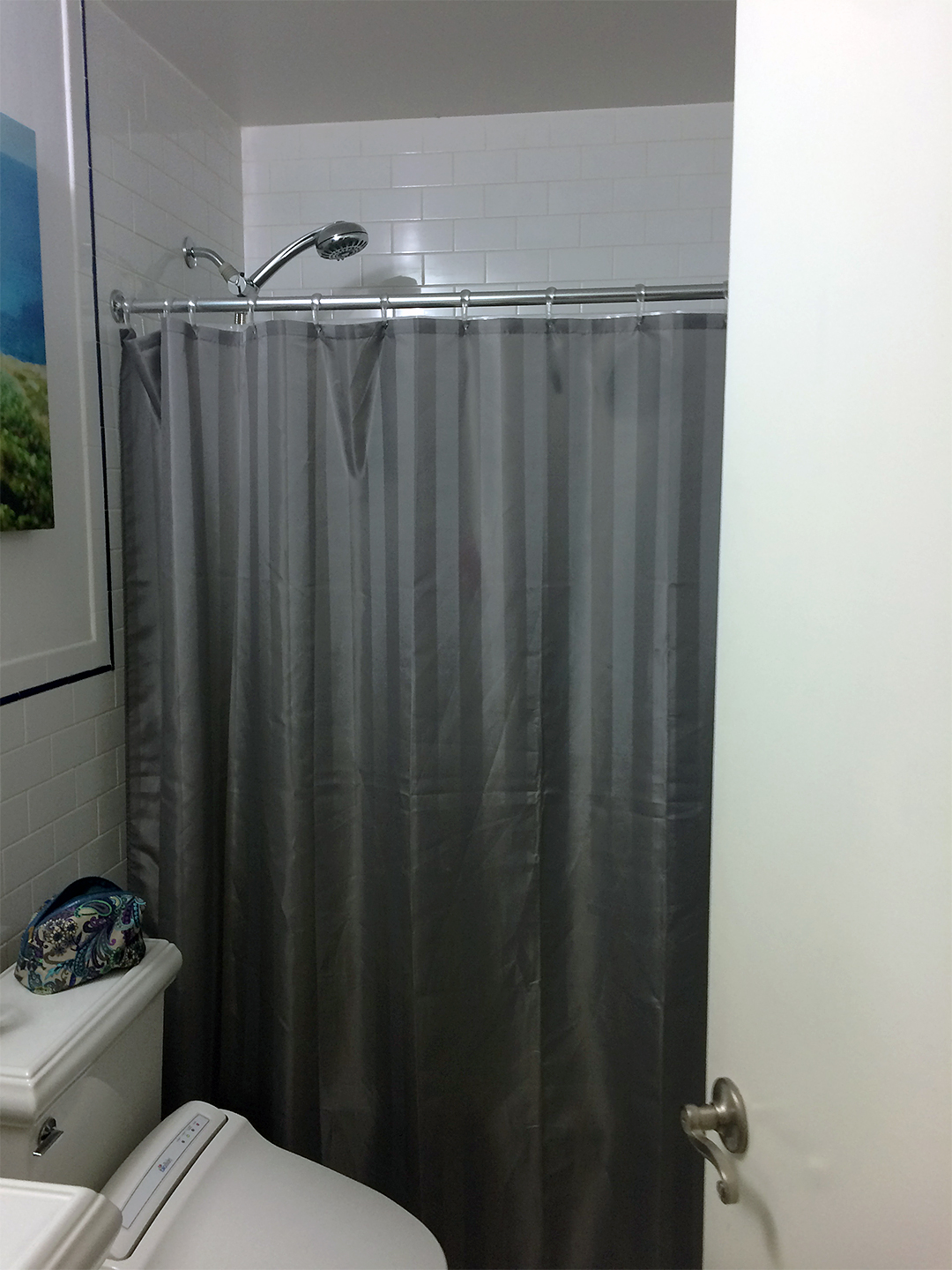 old shower with shower curtain