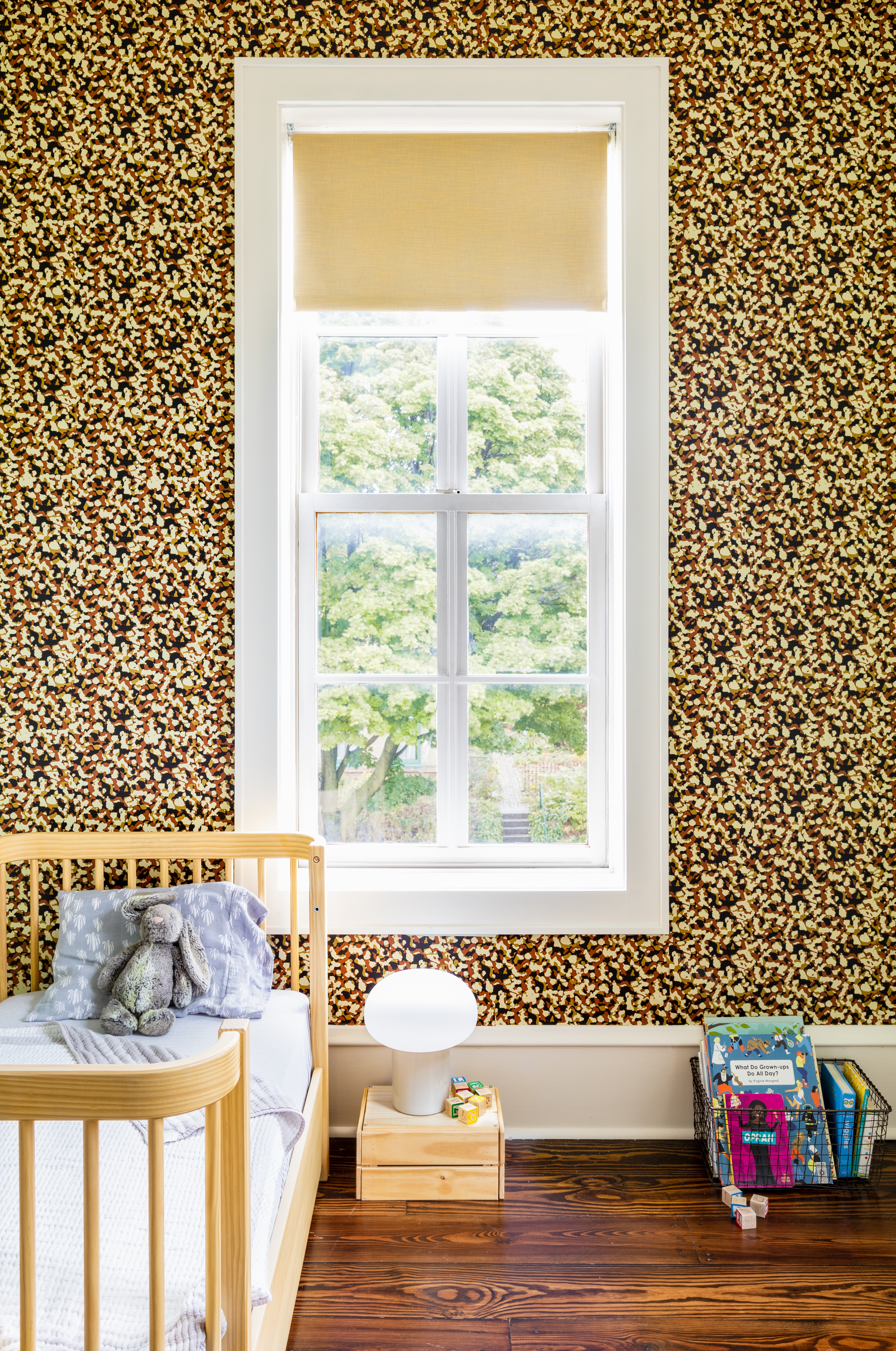 camo wallpaper in a nursery