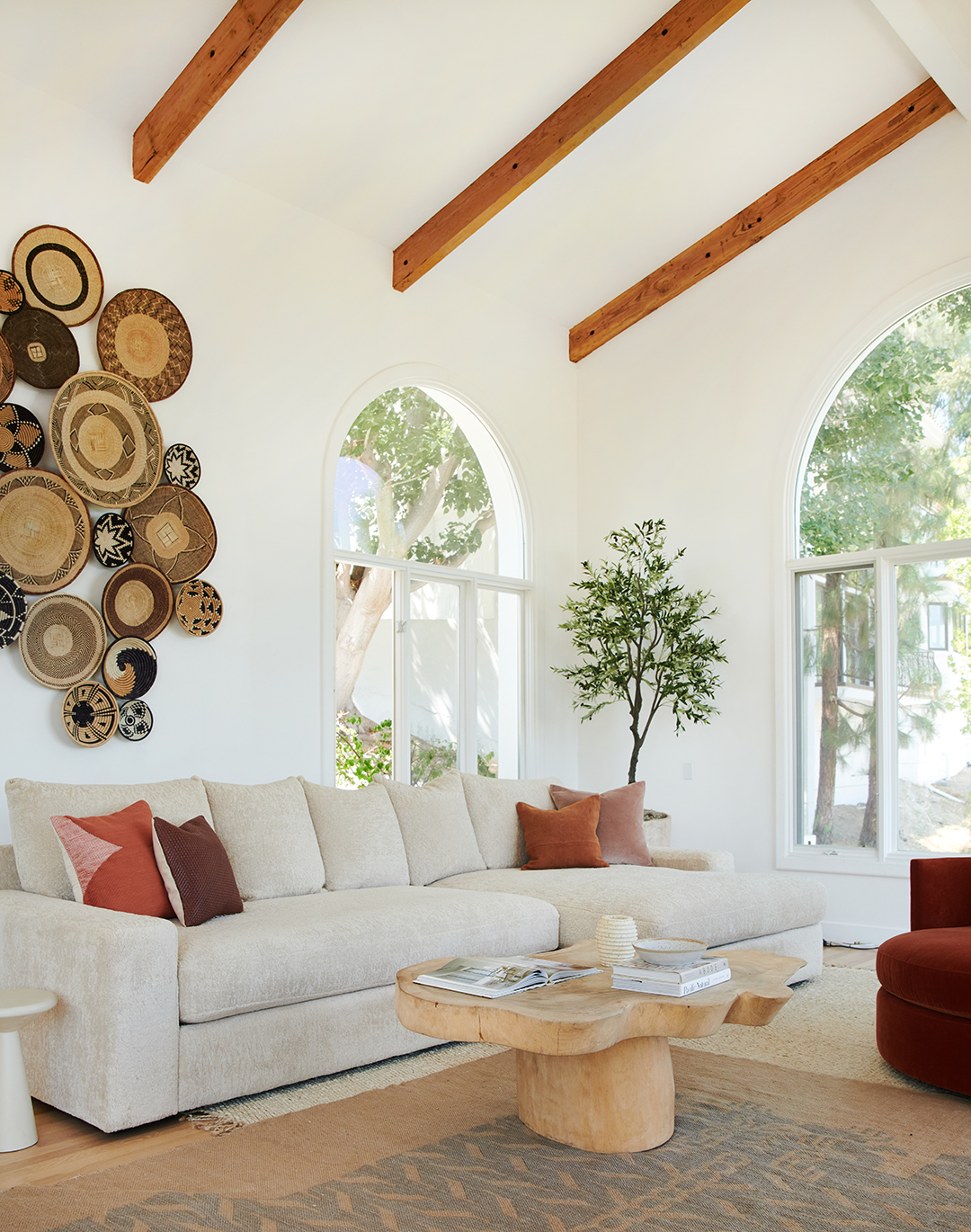 living room close-up, wooden coffee table, beige sectional sofa