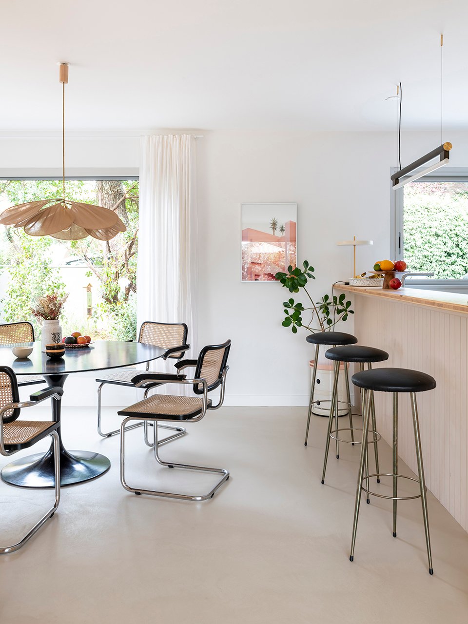 dining area next to plywood kitchen