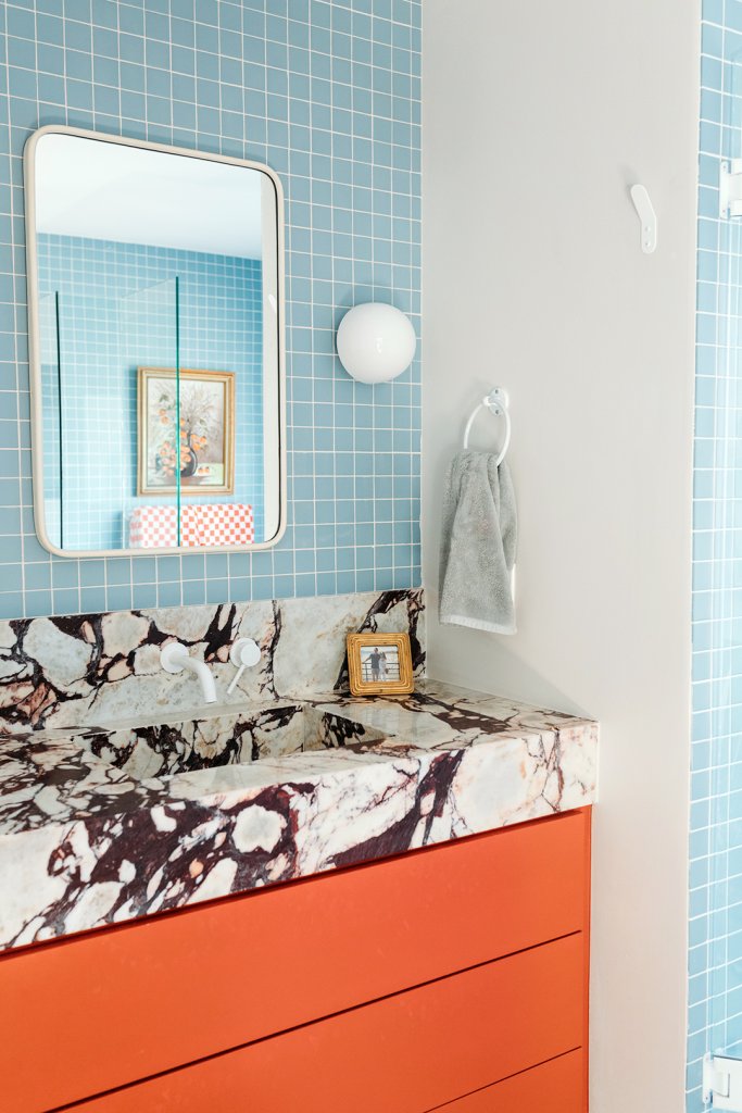 powder blue bathroom with marble vanity