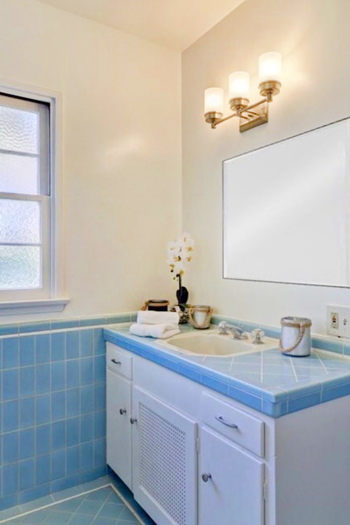blue tiled bathroom before updates