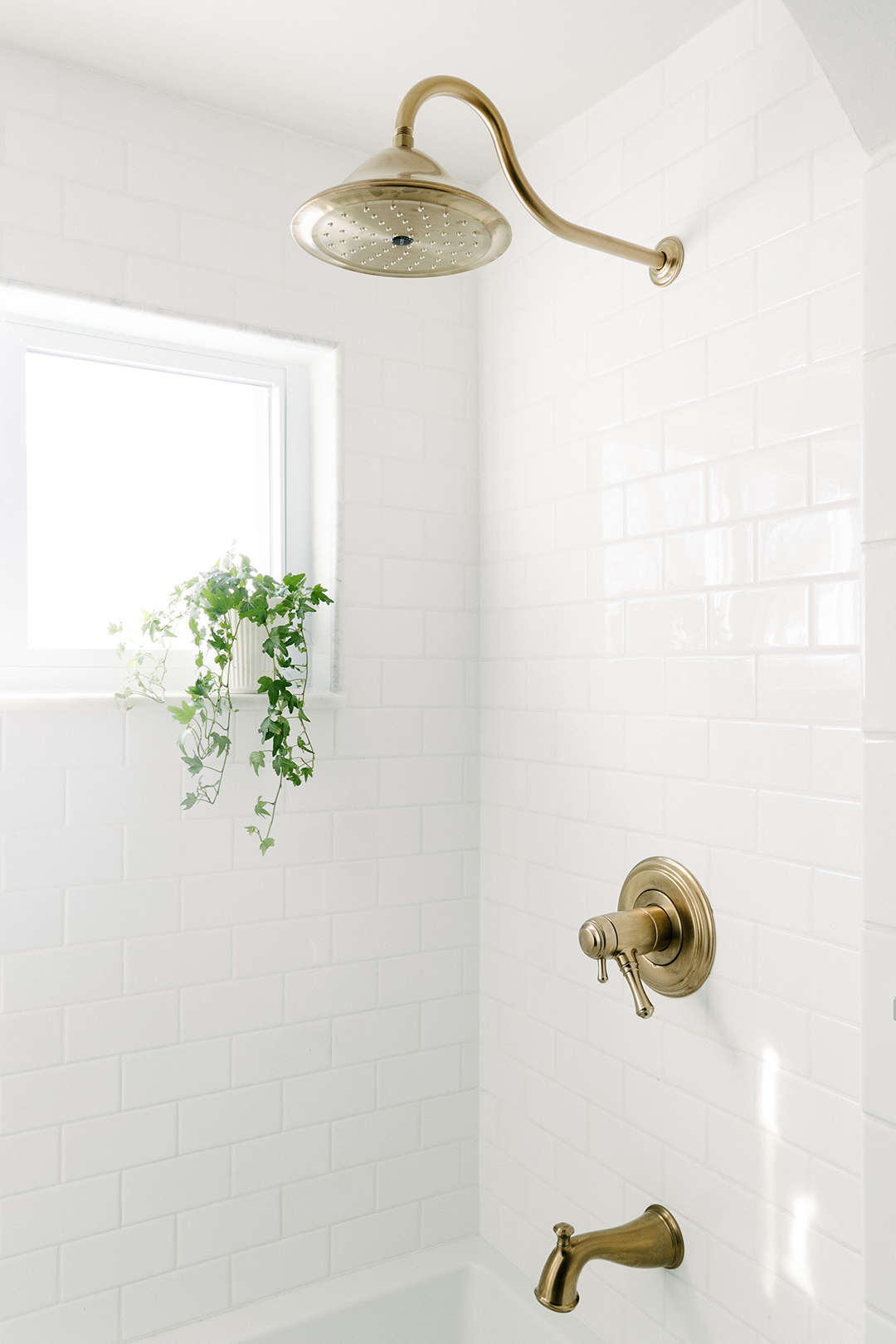 white shower subway tile