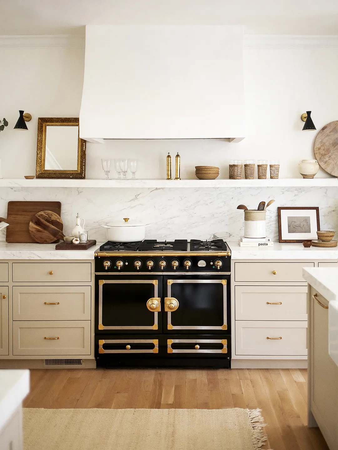 Black stove in neutral kitchen