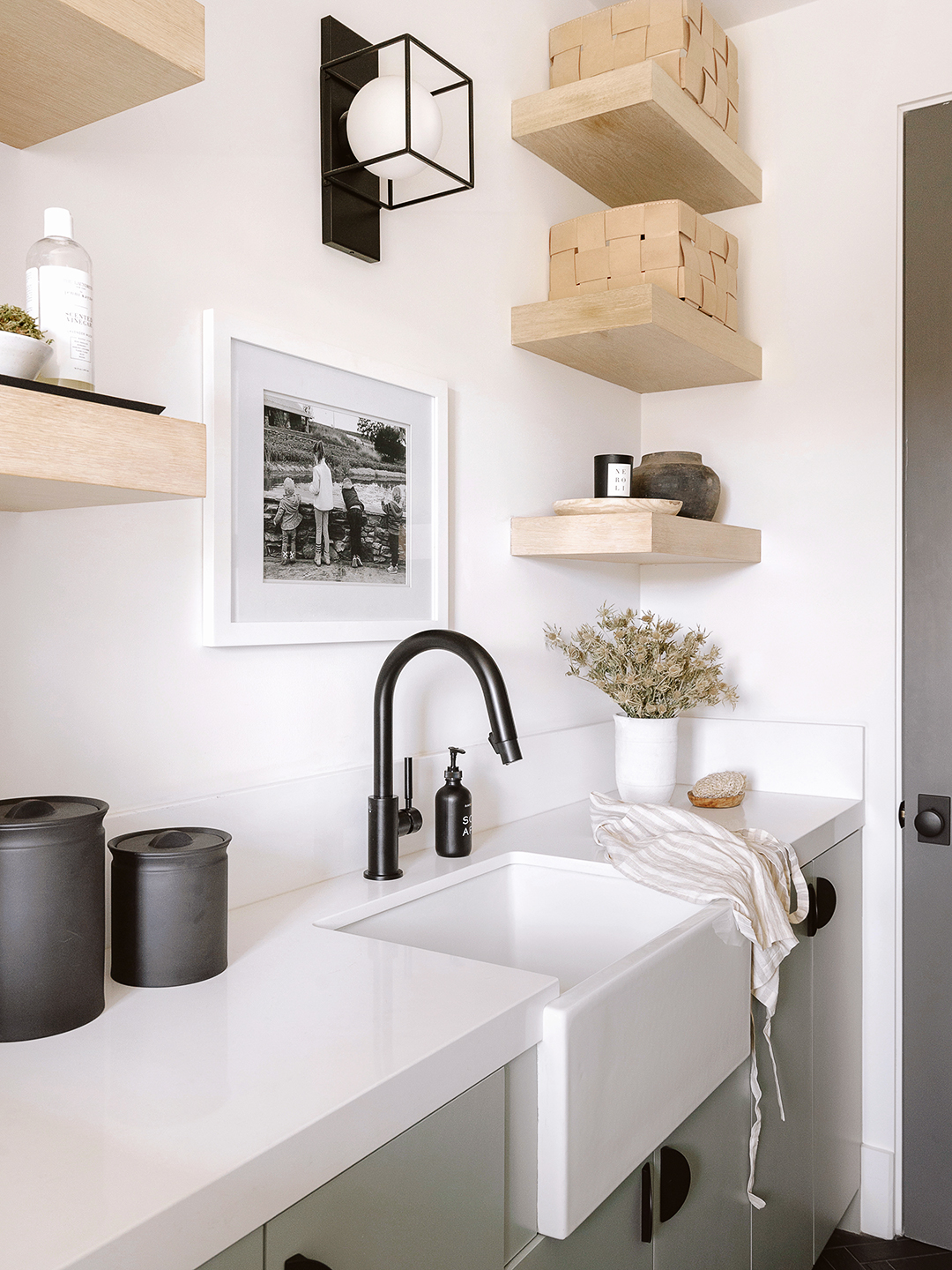 This Minimalist Homeowner Found a Middle Ground Between Gray and Green for  Her Laundry Room Cabinets | domino, image size:1080x1440