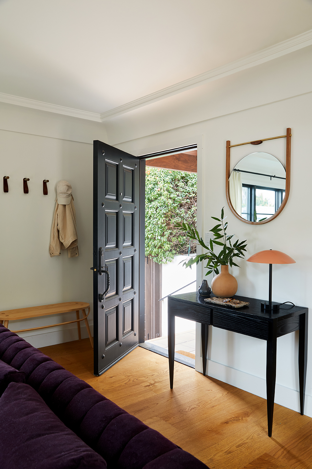 black front door open to house