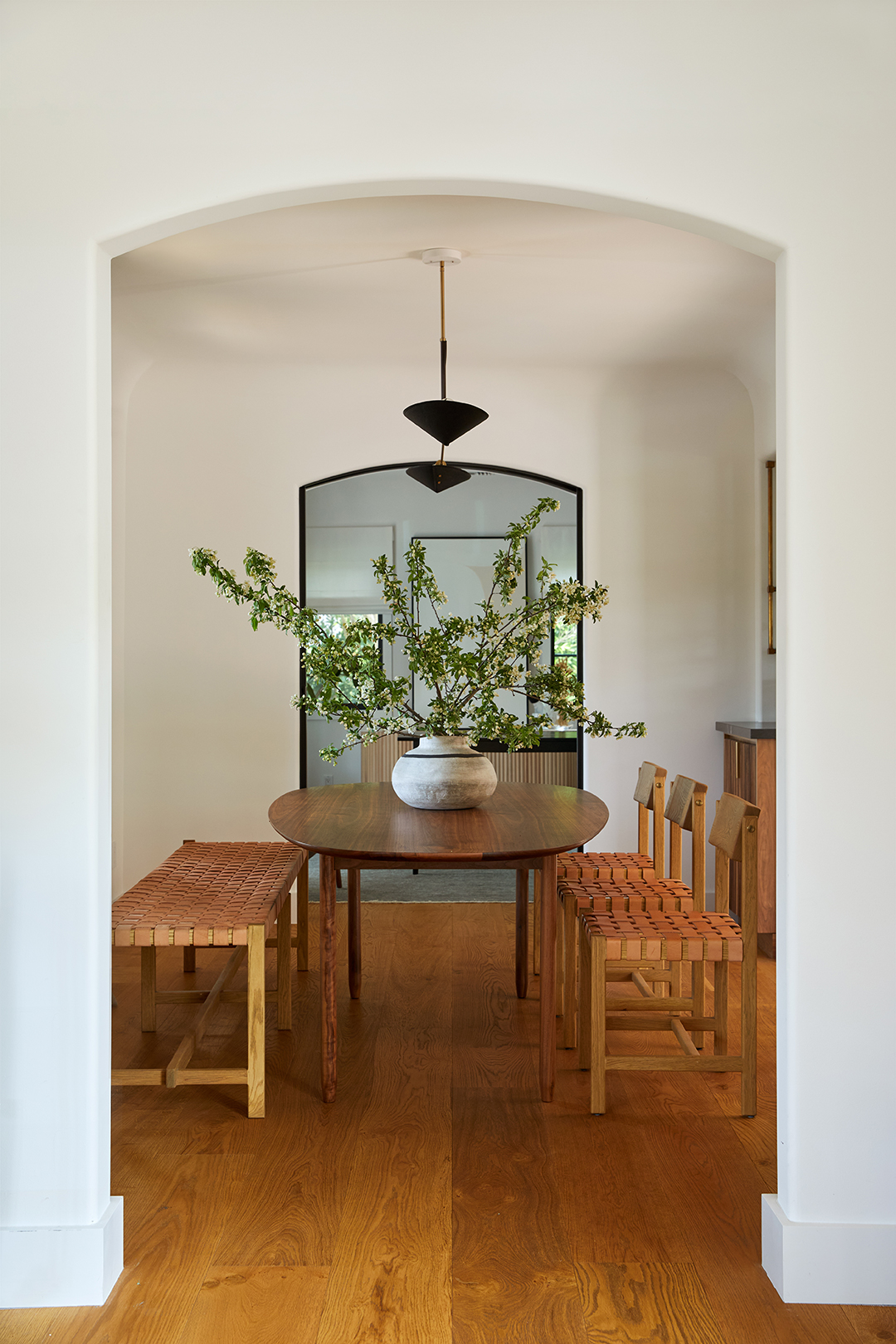 leather and wood dining space