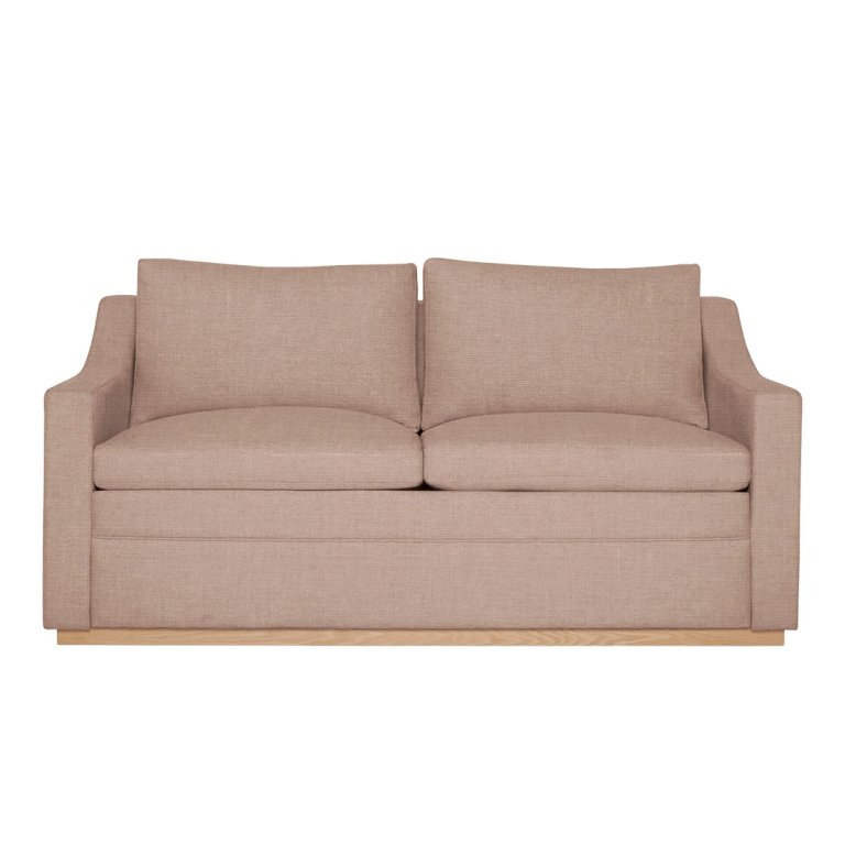 Pink sleeper sofa on a white background.
