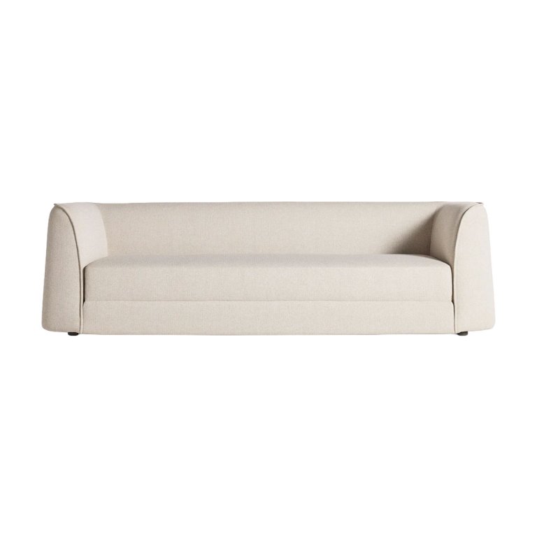 Modern, long white sofa on white background.