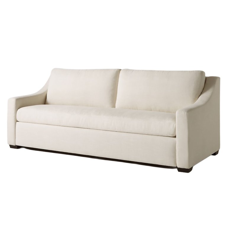 White sloped arm sofa on a white background.