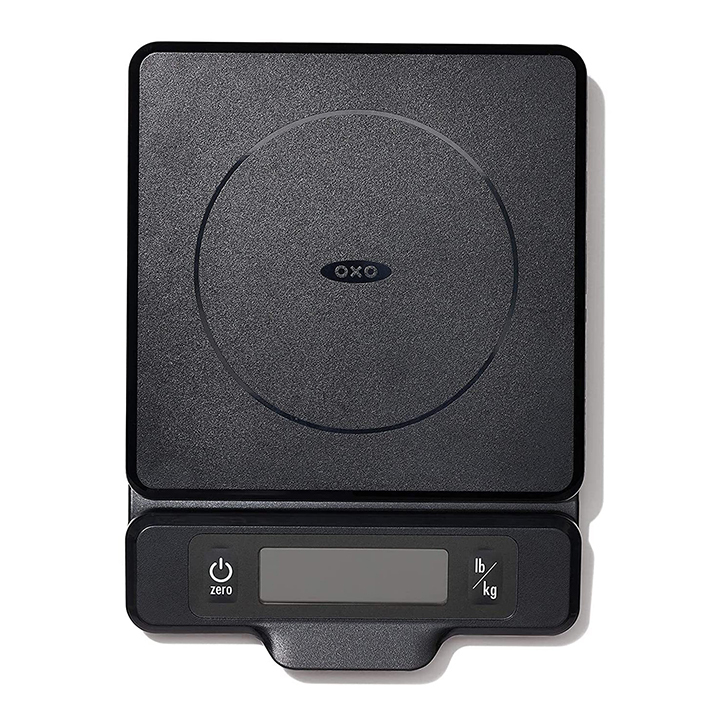  Oxo black food scale against a white background.