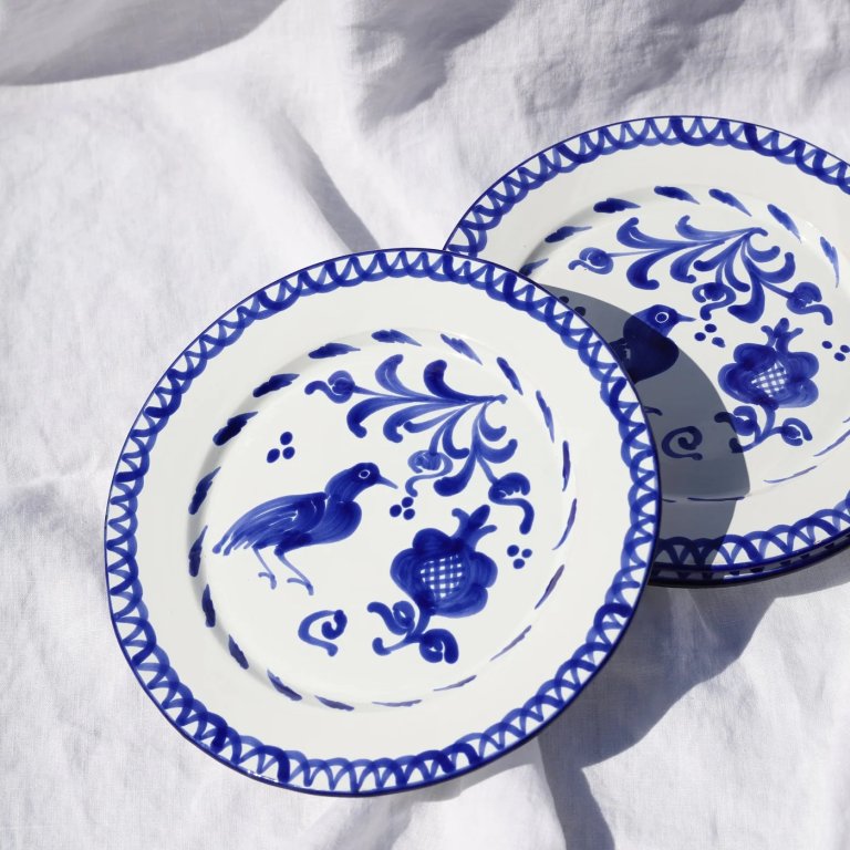  blue and white plate with bird design