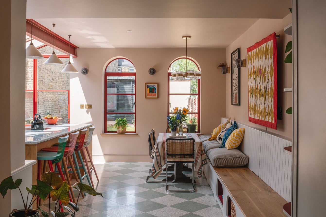 This Architect's Bright Red Kitchen Windows and Beams Can’t Go Unnoticed
