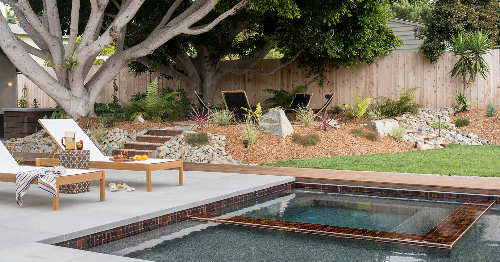Once a Plot of Grass, This Yard Now Has a Pool, Deck, ADU, and Tiled Fire Pit
