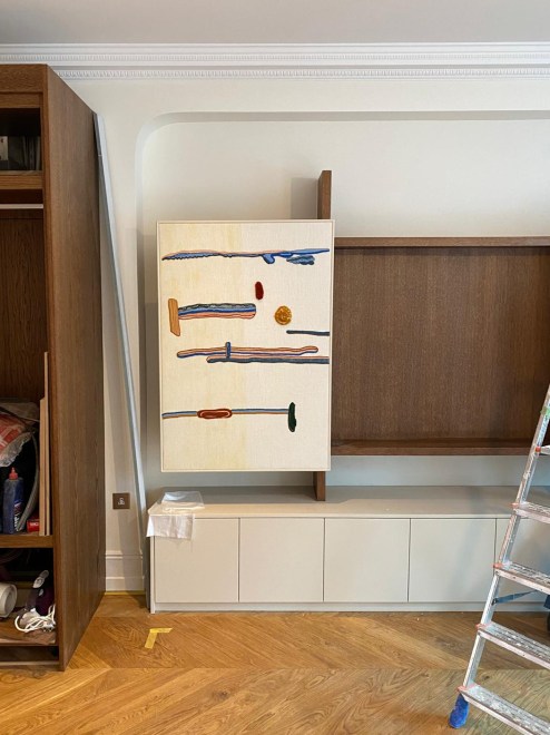 The Fiber Art in This London Living Room Is Actually One Big TV Coverup