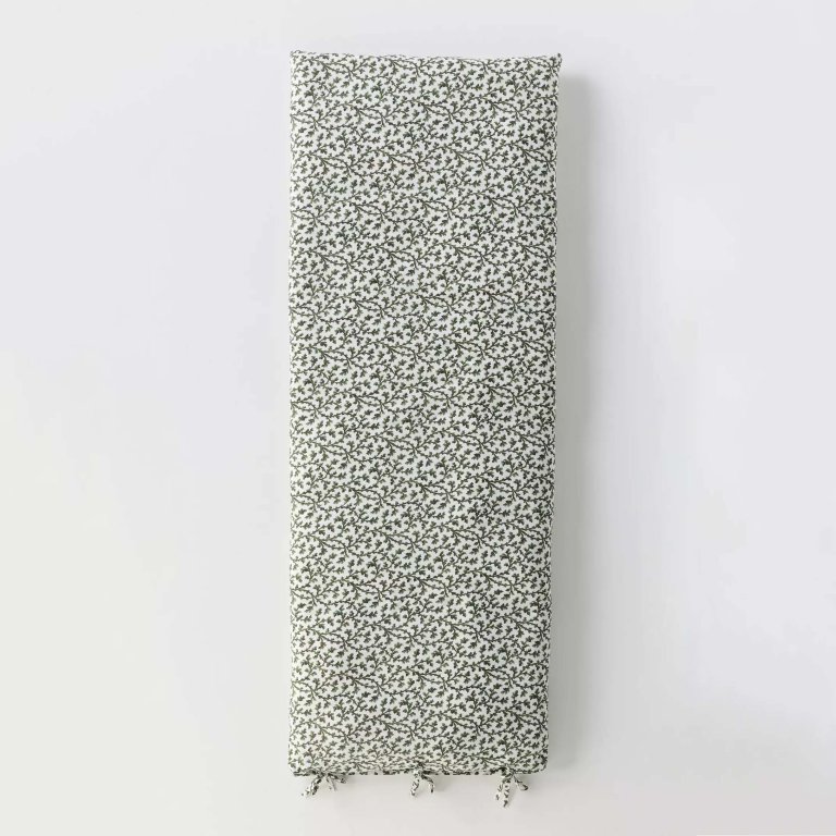 Vine patterned sofa topper