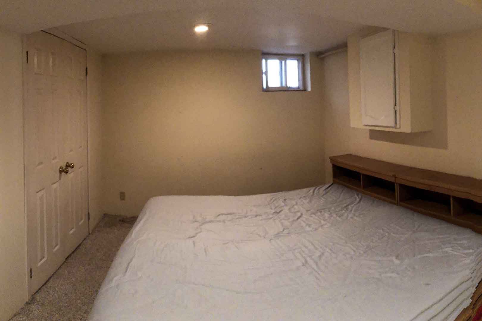 beige basement bedroom