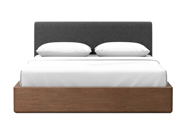  Dark wood bed frame with charcoal-colored upholstered headboard by Thuma.