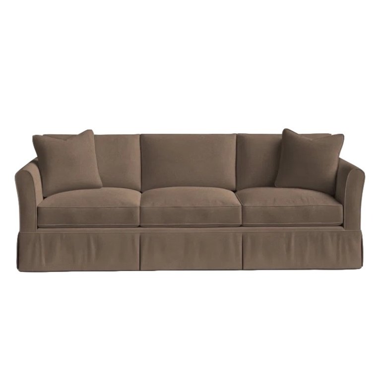  Brown slipcovered sofa