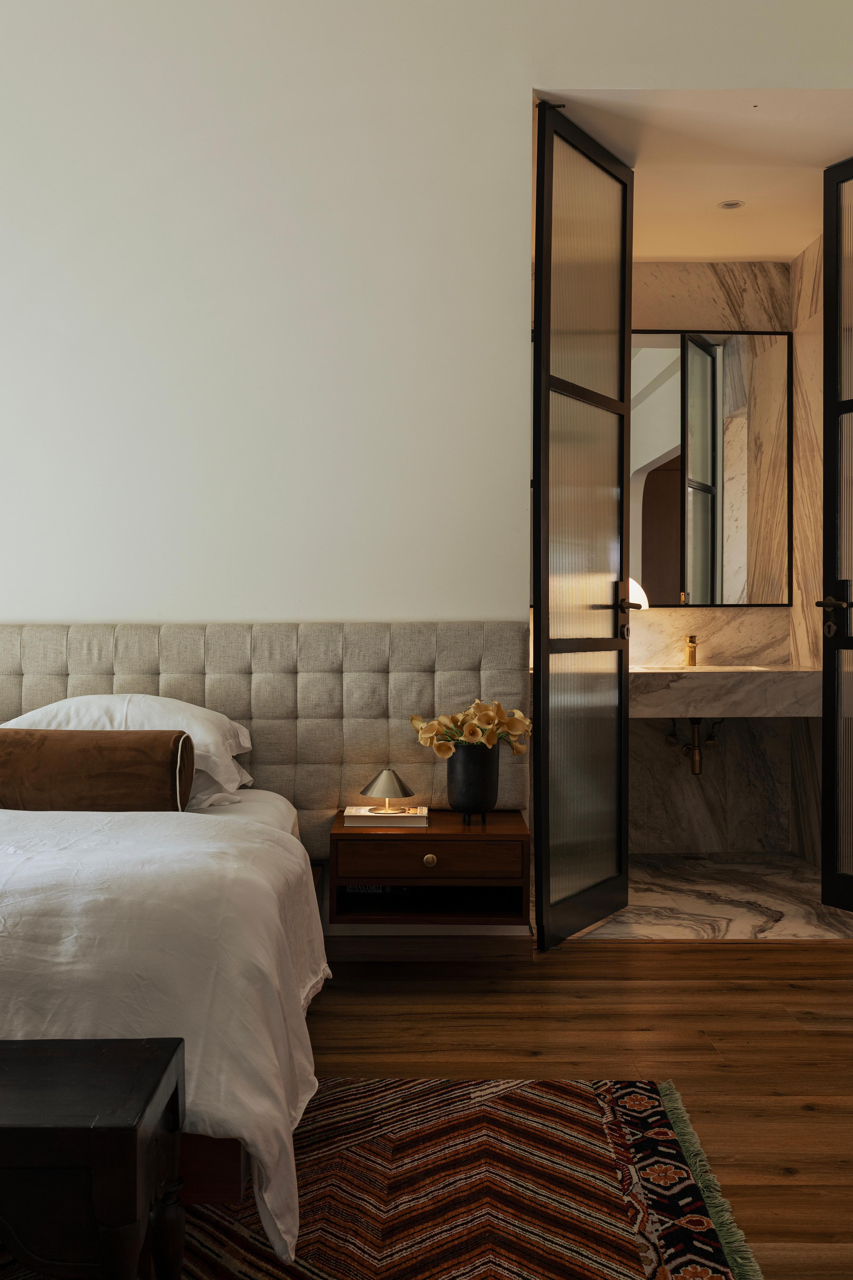 view into bathroom from bedroom