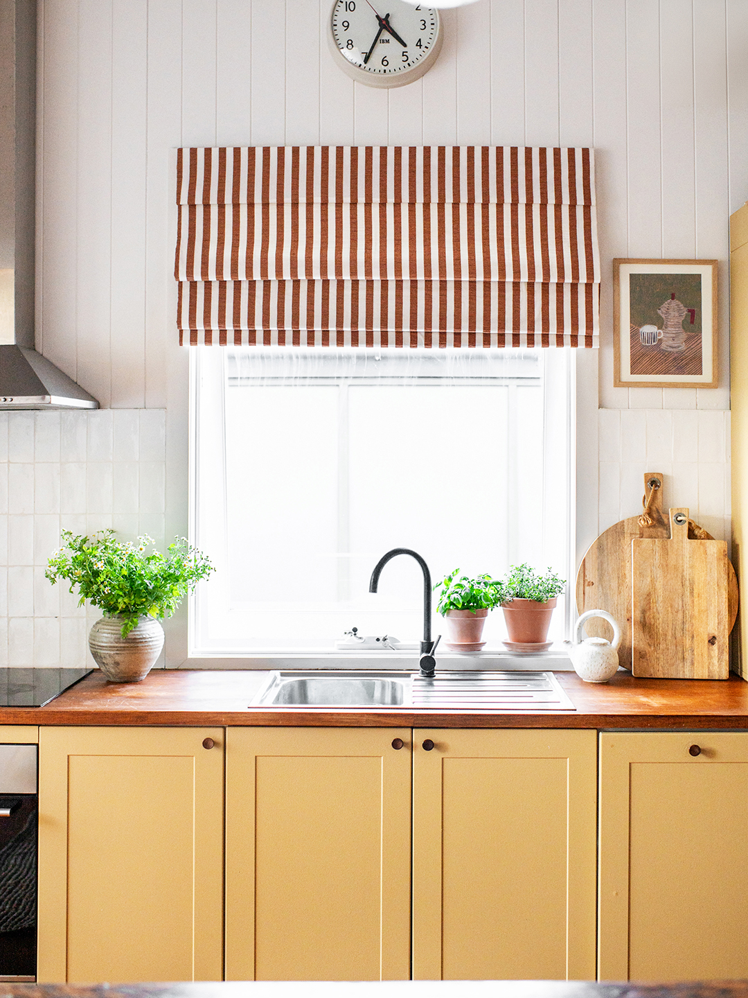 Kitchen with yellow cabinets