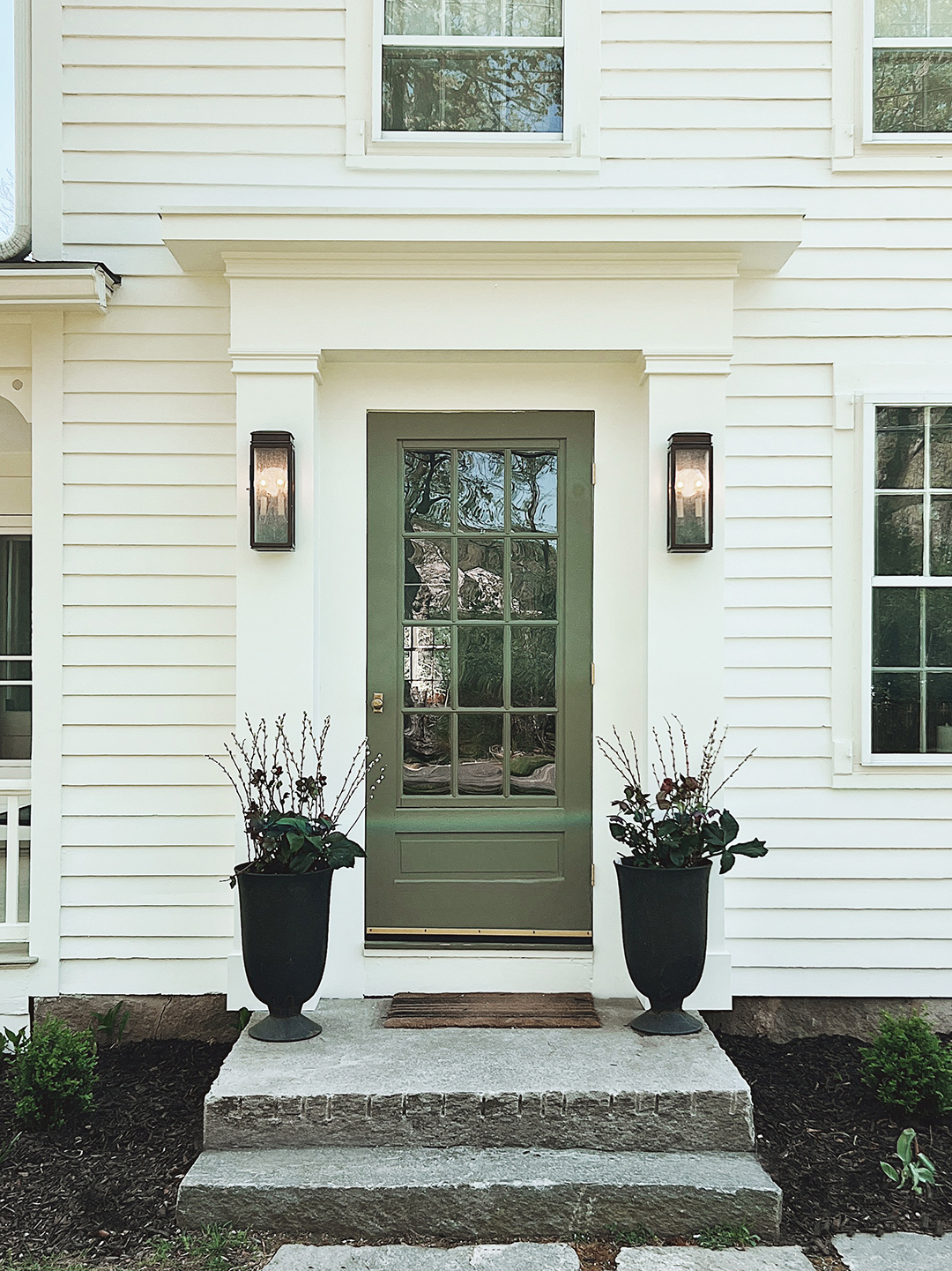 historic home exterior with green door