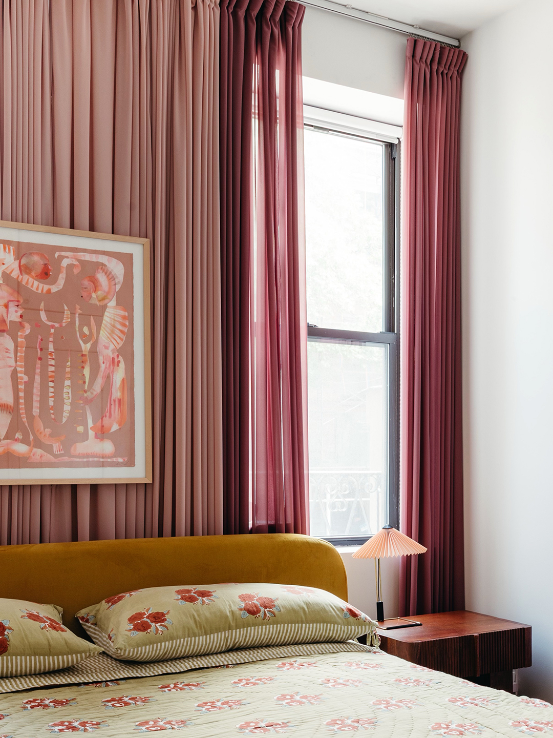 floral bedding with pink curtains