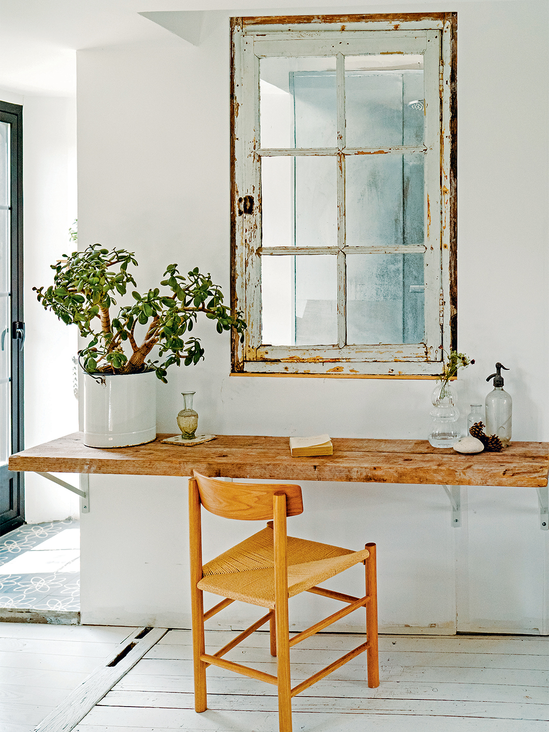 Wall with attached desk and internal window