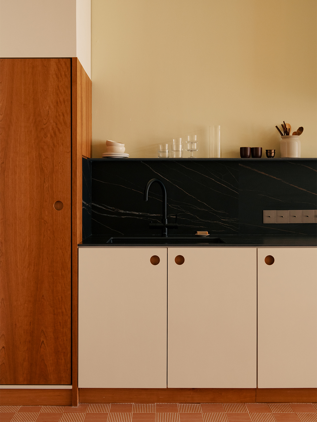 White and wood cabinets with no hardware