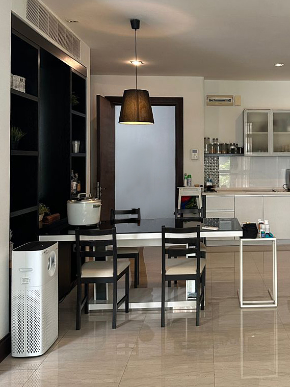 Black dining set in the middle of the kitchen