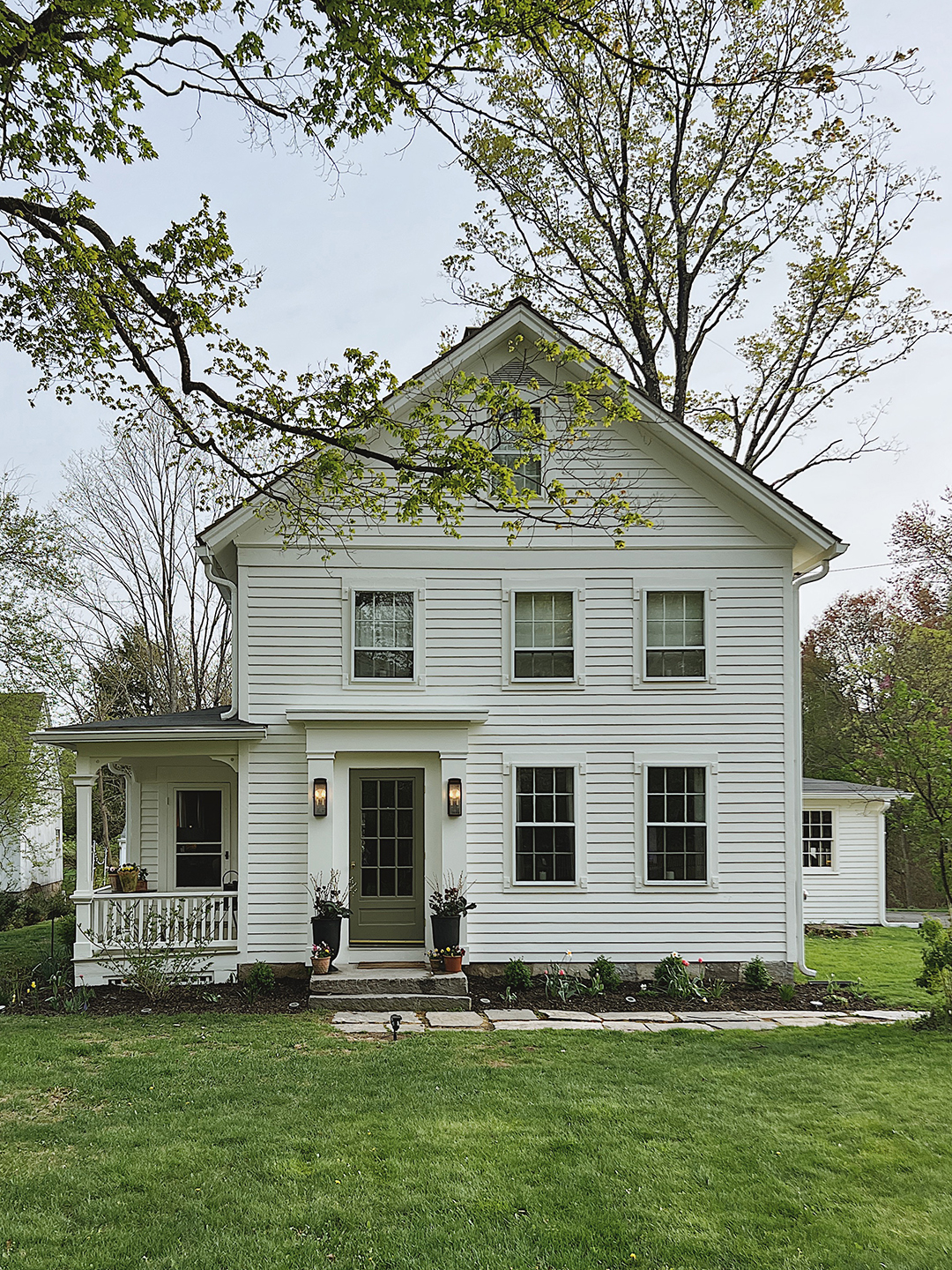 historic home exterior with green door
